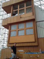 Tim Newby helping with the Chancel organ covering